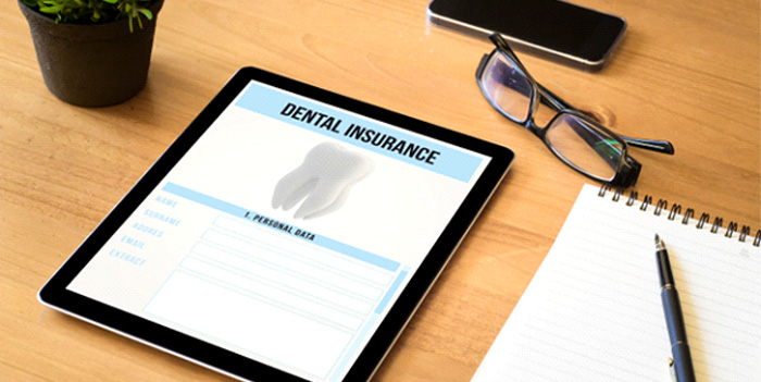 Dental insurance form on tablet in office