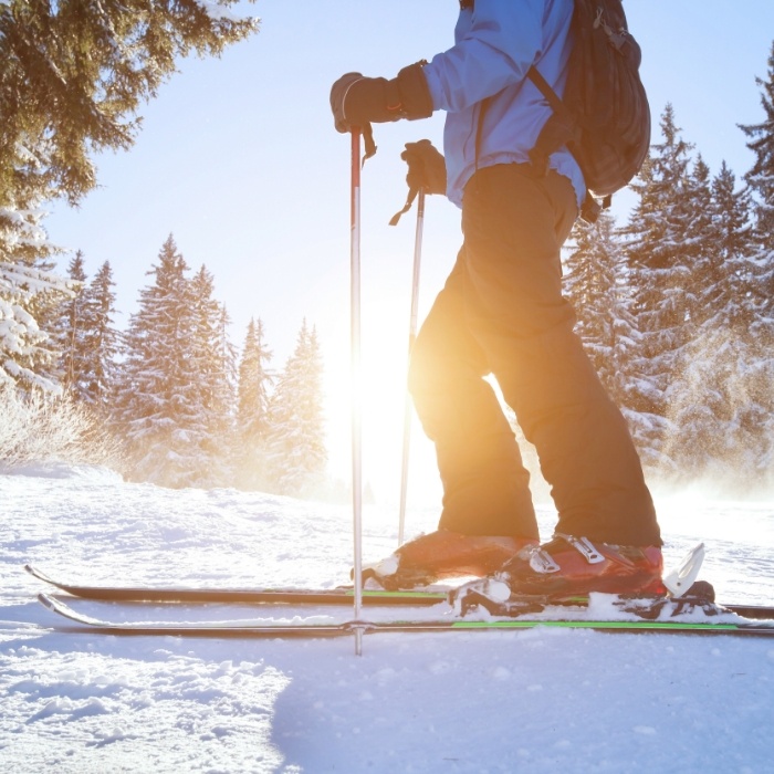 Person standing on skis in snow